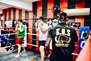 Energetic boxing class at King of Strength Boxing Gym.
